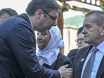 Serbian PM attacked at massacr...